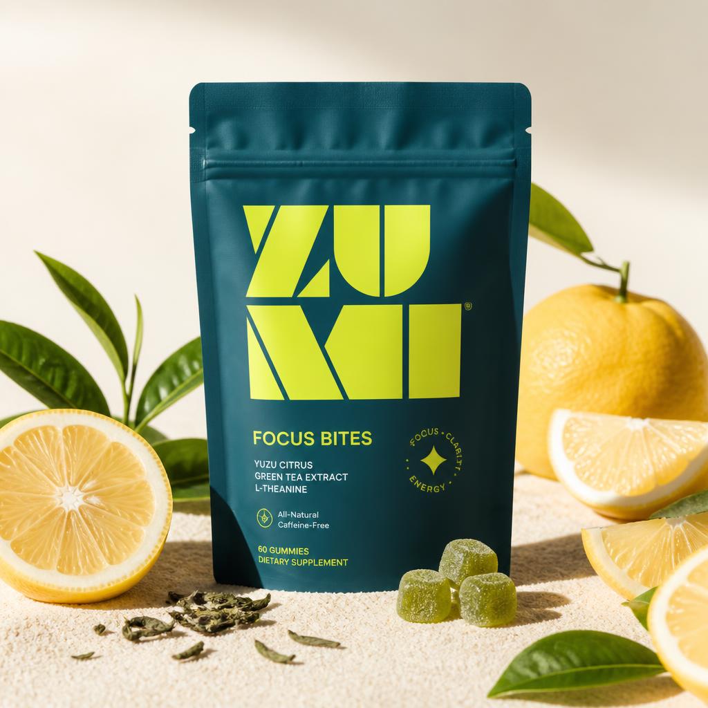 Zumi Focus Bites pouch with fresh citrus and green tea leaves